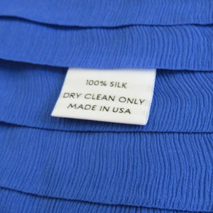 100% Silk, Dry Clean Only, Made in USA Care and Content Labels